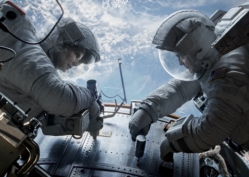 Gravity: Dr Ryan Stone (Sandra Bullock) and Matt Kowalski (George Clooney)